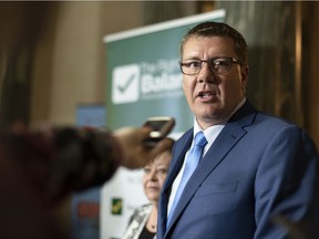 Premier Scott Moe speaks to media in the rotunda during Budget Day at Legislative Building in Regina, Saskatchewan on Wednesday March 20, 2019.