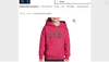 The pink, child-size hoodie features a three-leaf clover with the word “normal” underneath, followed by a four-leaf clover with the word “lucky,” and a large cannabis leaf with the word “superlucky.”