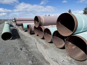 Pipes are seen at the pipe yard at the Transmountain facility in Kamloops, B.C., on March 27, 2017. The United States says it will impose preliminary anti-dumping duties of more than 24 per cent on large-diameter welded pipe from six countries, including Canada.