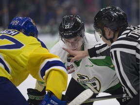 Prince Albert Raiders centre Eric Pearce prepares for a face-off during second-round WHL playoff action against the Saskatoon Blades.