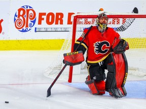 Calgary Flames goaltender Mike Smith reacts after surrendering a goal to the Colorado Avalanche during a Nov. 1 game at the Saddledome.