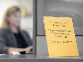 The criminal record check office at the Regina Police Service in Regina. The Saskatchewan government instead wants to find a company that can conduct the checks through a provider using a web-based service.