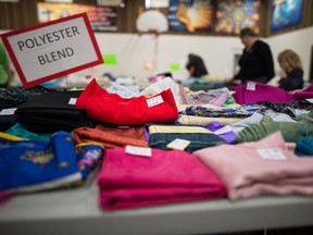 Fabric for sale during the Grandmothers 4 Grandmothers sale held at Glen Elm Church on Rothwell Street. Proceeds from the sale support relief efforts for African children orphaned by HIV/AIDS.