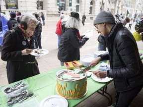 Saima Desai, right, organizer of the Fight for $15 Saskatchewan is holding "DEAD LAST," a street party/protest to 'celebrate' the fact that Saskatchewan has the worst minimum wage in the country. The event was held over the noon hour on Scarth Street and 11th Avenue.