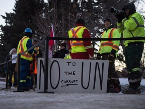 Yellow vest protesters stand in an designated area prior to Prime Minister Justin Trudeau's town hall at the University of Regina. Anti-UN sentiment is common in the movement.