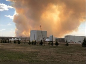 A grass fire burning near Biggar, Sask. has led to emergency responders asking people to leave the area and others to stay away from the fire zone. Photo taken by Bonnie Smith, Biggar. Shared on Twitter.