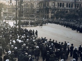 Copy of photograph from Winnipeg General Strike of 1919 hanging on wall at Archives of Manitoba