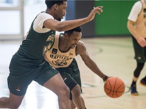 awrence Moore defends against Showron Glover in a Saskatchewan Rattlers training camp session in Saskatoon on Friday, May 4 2019.