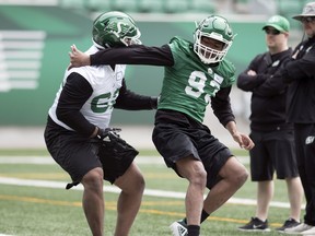 The feistiness of Chester Graves (right), shown during the Riders' rookie camp, earned him the label of Murray's Monster on Tuesday.