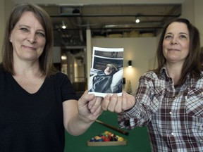 Dawn Hale, left, and April Boldt are daughters of the late Donn Hale. Donn was a patient of Regina Patient Transfer Services and the attendants allowed him to make a stop at Milky Way for his last ride before being taken to palliative care. His daughters stand in front of a pool table where their father liked to play.