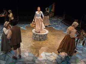 Cast members from the Globe Theatre's Beauty and the Beast rehearse a scene on the theatre's main stage.