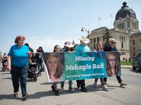 Friends, family and supporters of Mekayla Bali walk together during the Walk of Hope event at the Saskatchewan Legislative Building, aimed at raising awareness about missing children in Saskatchewan.
