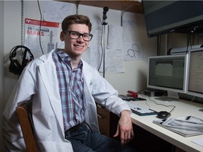Wil Norton, a second-year engineering student at the University of Regina, sits at his desk in the university's Research and Innovation Centre. He is among students working on designing an airlock system that could theoretically be used on an early mission to Mars.