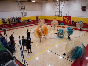 Students play "bubble soccer" during the Awake-A-Thon at Sheldon Williams Collegiate. The event sees students stay awake for 24 hours as a fundraising initiative for the Canadian Mental Health Association, Regina Branch.
