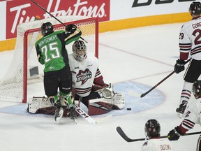 Prince Albert Raiders' Sean Montgomery scores on Guelph Storm goaltender Anthony Popovich in first period 2019 Memorial Cup action in Halifax on Tuesday, May 21, 2019.