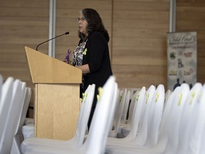 Lori Whiteman, daughter of a missing person, speaks Monday at the RCMP Heritage Centre during the seventh annual Missing Persons Week ceremony. The Government of Saskatchewan has proclaimed the week of May 5 to May 11 as Missing Persons Week. This year's theme is "Safety for All."