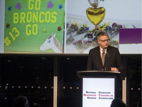 Kevin Mitchell, of the Saskatoon StarPhoenix, accepts the award for Sports during the National Newspaper Awards in Toronto on Friday, May 3, 2019.