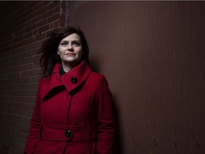 Leader-Post court reporter Heather Polischuk, who goes by the pen name H.P. Bayne for her Sullivan Gray series of novels, stands near an abandoned warehouse just off Winnipeg Street.