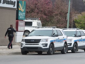 Police attend an incident at the Quality Inn on Victoria Avenue.