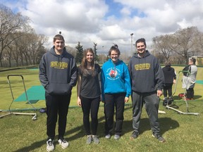 Competitive lawn bowlers (left to right) Carter Watson, Sydney Boyd, Jordan Kos and Brandon Watson stand in front of one of the greens at the Regina Lawn Bowling Club at the club's Open House on May 11, 2019.