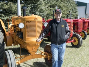 Lloyd Wolfe with his antique tractor collection on his acreage east of Balgonie. Wolfe has been bringing some of his antique trucks and tractors to Canada's Farm Progress Show for 18 years. This year he received a letter from the Regina Exhibition Association Limited (which runs Farm Progress) saying the antique show and parade will not be happening.