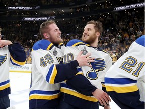 Ivan Barbashev #49 and Brayden Schenn #10 of the St. Louis Blues celebrate their win over the Boston Bruins in Game Seven of the 2019 NHL Stanley Cup Final at TD Garden on June 12, 2019 in Boston, Massachusetts.