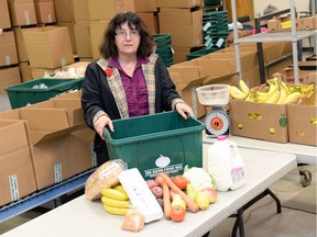 Dana Folkersen, executive director of Regina Education and Action on Child Hunger (REACH), stands by some healthy food choices in Regina in 2016. Its initiative REACH Into the Park provides healthy lunches for children whose families can't always afford meals.