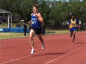 Ron MacLean, left, of Sheldon-Williams Collegiate is shown during a gold-medal performance at the 2019 Saskatchewan High Schools Athletic Association track and field championships on the weekend.