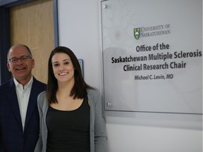 (left to right) Dr. Michael Levin, Saskatchewan Multiple Sclerosis Clinical Research Chair, and PhD student Hannah Salapa, stand in front of the office of the Saskatchewan Multiple Sclerosis Clinical Research Chair in Saskatoon's City Hospital on June 11, 2019.