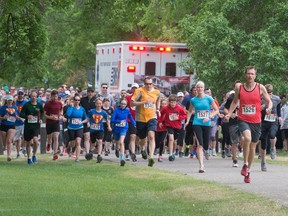 Runners take off near the T.C. Douglas building during Regina Paramedics with Heart's first walk/run to create awareness of PTSD in first responders and other service providers.