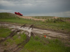 An RCMP officer pilots a 4x4 truck through the force's off road vehicle track at its Academy at Depot Division in Regina.
