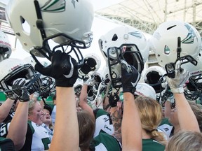 The Saskatoon Valkyries celebrate at Mosaic Stadium on Saturday after defeating the Regina Riot 25-3 in the Western Women's Canadian Football League's championship game.