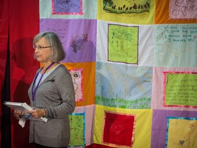 Chief commissioner Marion Buller listens before the start of hearings at the National Inquiry into Missing and Murdered Indigenous Women and Girls, in Smithers, B.C., on September 26, 2017. The long-awaited inquiry into missing and murdered Indigenous women has publicly released its findings including calls for health service providers to develop education programs for Indigenous children and youth on the issue of grooming for exploitation.