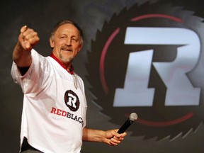 CFL great and former Ottawa Roughrider, Tony Gabriel, speaks to the audience during the official launch and team announcement for the Ottawa RedBlacks CFL team at the Ernst and Young Centre Saturday, June 8, 2013.   Darren Brown/Ottawa Sun/QMI Agency ORG XMIT: POS1607230108122708