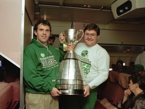 Rob Vanstone and Patrick Davitt on the flight home from Toronto after the Saskatchewan Roughriders won the 1989 Grey Cup. Bryan Schlosser photo.