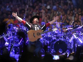 Garth Brooks performs at State Farm Stadium on March 23, 2019, in Glendale, Ariz.