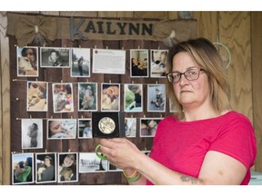 Sandra LaRose's teenage daughter, Kailynn Bursic-Panchuk, died in a distracted driving accident last year. Before her death, Bursic-Panchuk had declared her intent to donate her organs. LaRose holds up a medal given to the family from Saskatchewan Transplant Program after Bursic-Panchuk's organs were donated.