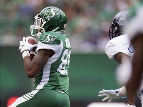 The Roughriders' Kyran Moore takes off on a 98-yard touchdown reception Monday against the visiting Toronto Argonauts.
