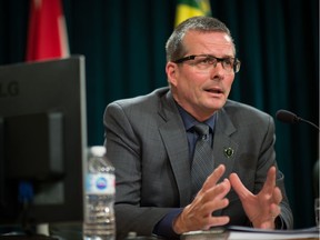 SaskPower CEO Mike Marsh speaks to media at a press conference following the reslease of the Crown's annual report at the Saskatchewan Legislative Building.