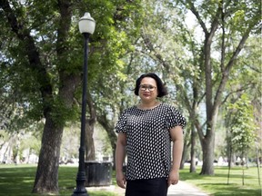 Judith Veresuk, executive director of the Regina Downtown Business Improvement District, stands in Victoria Park.