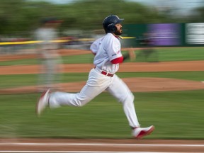 Regina Red Sox infielder Ivan Nunez runs to first base after recording a hit during Western Canadian Baseball League action Tuesday against the Weyburn Beavers at Currie Field.
