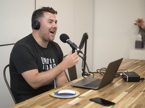 Dale Richardson, who is the founder of the Saskatchewan Podcast Network, talks during one of his podcasts at the Path Cowork in Regina.