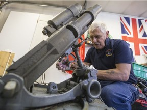 BESTPHOTO SASKATOON,SK--JULY 15/2019-0716 news museum mortar- Kevin Hicks, who works with the Saskatoon War Artifacts Museum, speaks about the restoration he is doing on a Leichter Minenwerfer trench mortars, from the first World War, at his home in Saskatoon, SK on Monday, July 15, 2019.