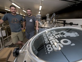 Pile O' Bones Brewing Company's  general manager Glenn Valgardson, left, and director Josh Morrison Director in their new space that is under  construction on Saskatchewan Drive.