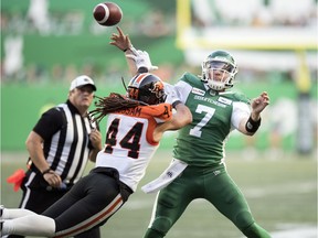 B.C. Lions defensive back Isaiah Guzylak-Messam pressures Saskatchewan Roughriders quarterback Cody Fajardo as he releases a pass Saturday at Mosaic Stadium.