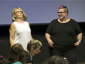 Sue Schmid, left, ASL interpreter, and Amber Galloway, ASL music interpreter, take part in a music interpreting workshop at The Exchange and in Regina.