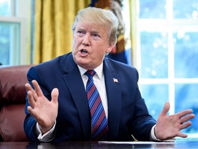 U.S. President Donald Trump speaks after announcing an agreement with Guatemala regarding people seeking asylum in the Oval Office of the White House in Washington, D.C., on Friday, July 26, 2019.