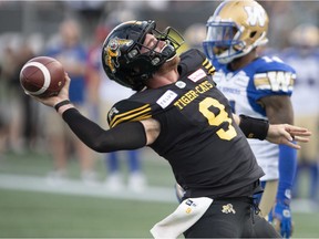 Hamilton Tiger-Cats quarterback Dane Evans celebrates a touchdown during Friday's 23-15 victory over the visiting Winnipeg Blue Bombers.