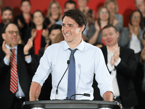 Prime Minister Justin Trudeau receives a standing ovation while addressing Liberal Party candidates in Ottawa, July 31, 2019.