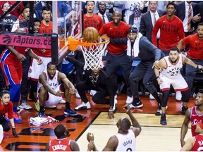 Kawhi Leonard, squatting at left, watches as his game-winning ball goes in, to clinch the series in Game 7, as the Toronto Raptors defeat the Philadelphia 76ers, in Toronto on May 13, 2019. His performance in the game is typified by the hyper-concentration and exceptional effort exhibited when facing ambitious goals, Referred to as the clutch state, it’s best described as the ability to dig deep to achieve a goal or bust through a performance plateau.